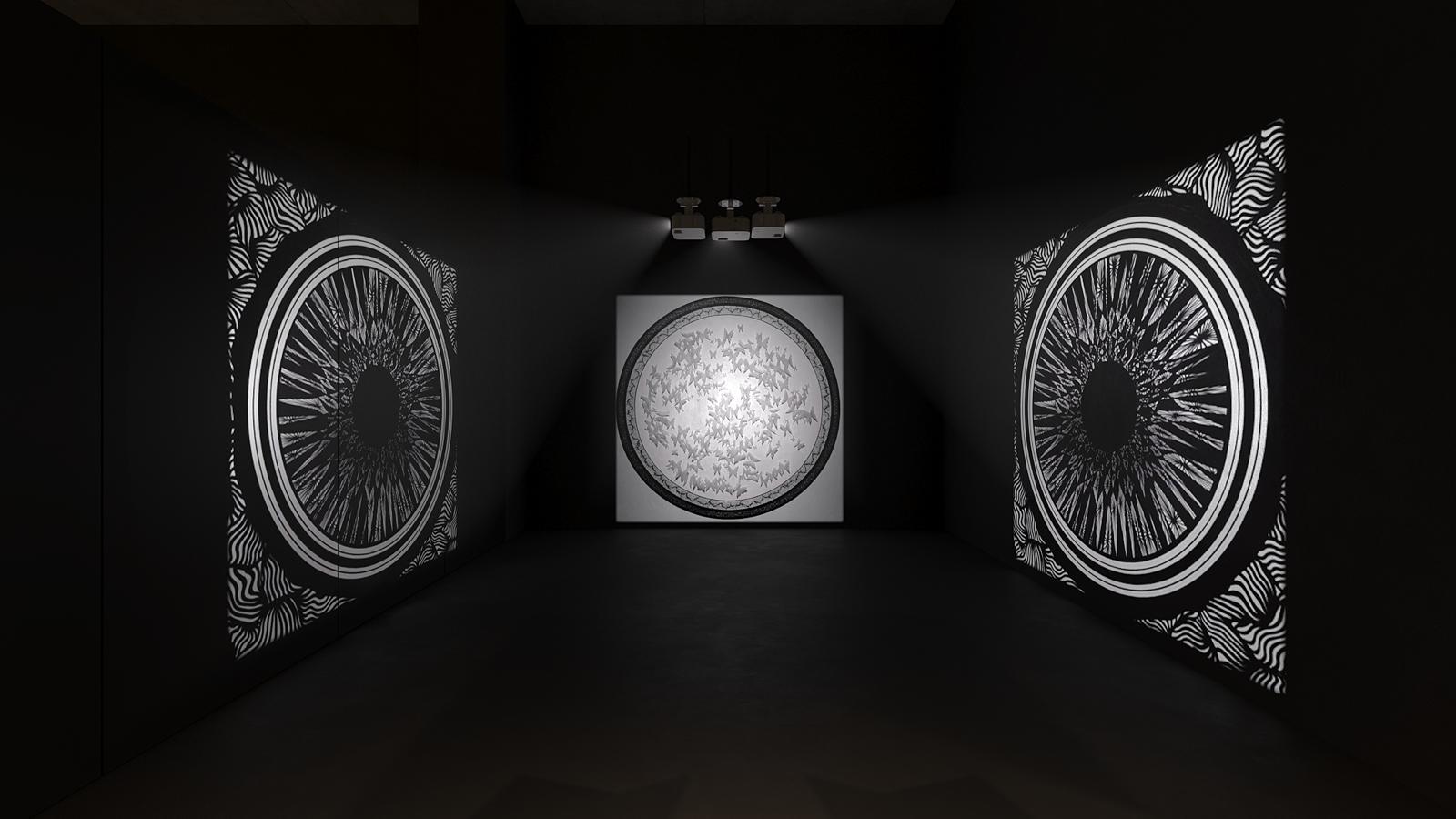 Symmetrical room with large circular graphic works facing one another and a spotlit piece at the end