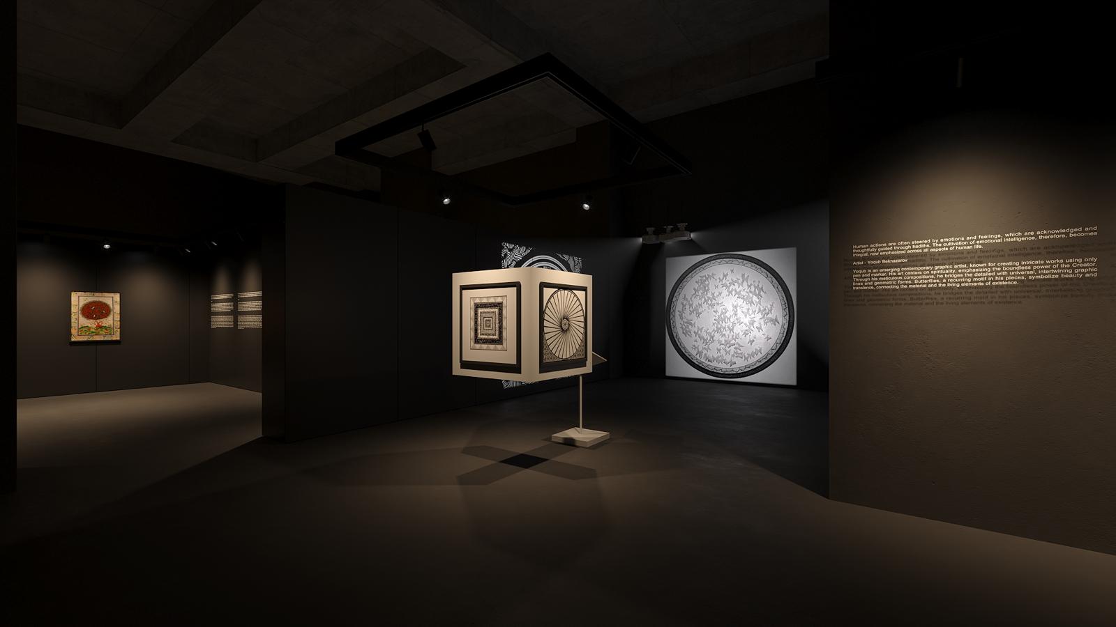 A rotating four-sided display stand carrying graphic works, beside a lit wall text